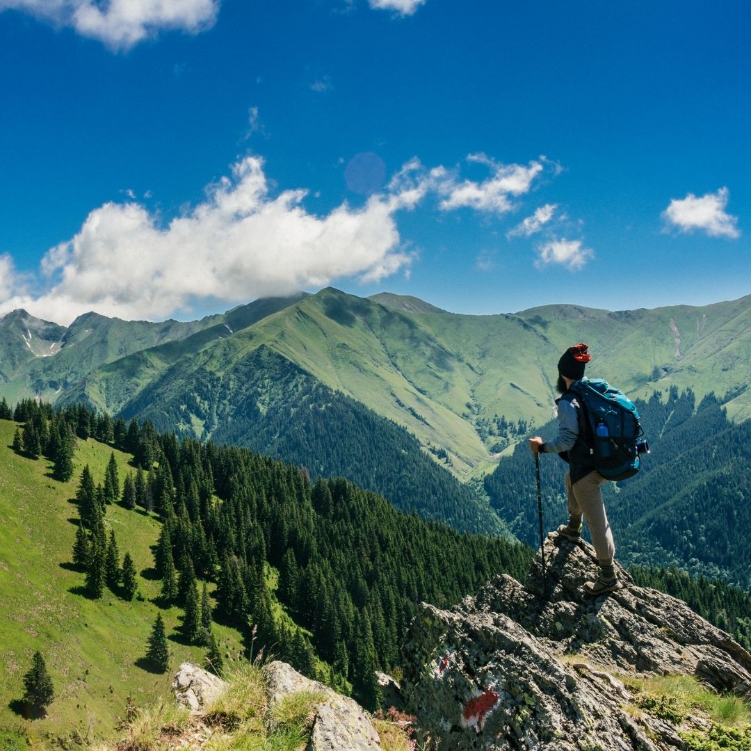 man hiking a mountain